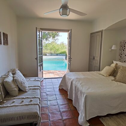 guestroom two with direct access to terace and pool