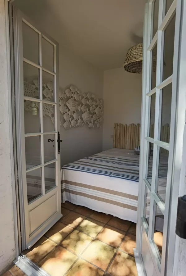 guestroom one with direct access to terace and pool