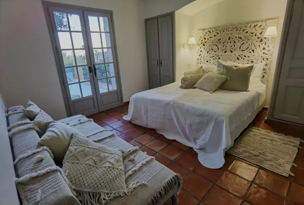 guestroom two with direct access to terace and pool